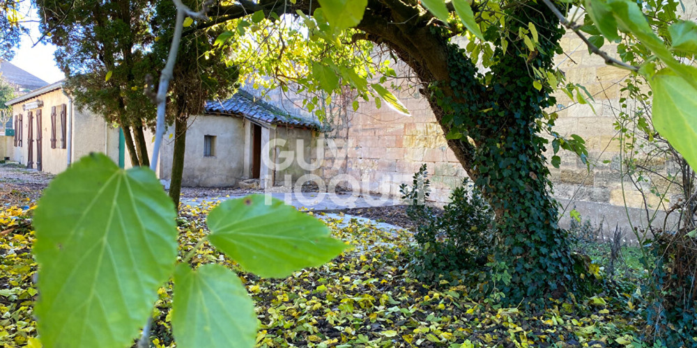 maison à LES BILLAUX (33500)