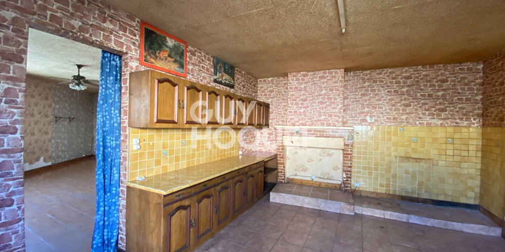 maison à LES BILLAUX (33500)