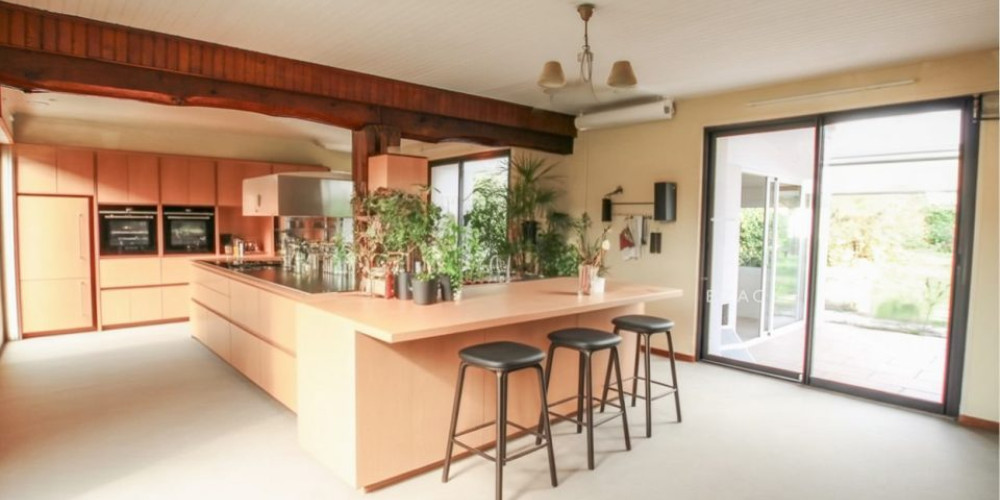 maison à LES BILLAUX (33500)